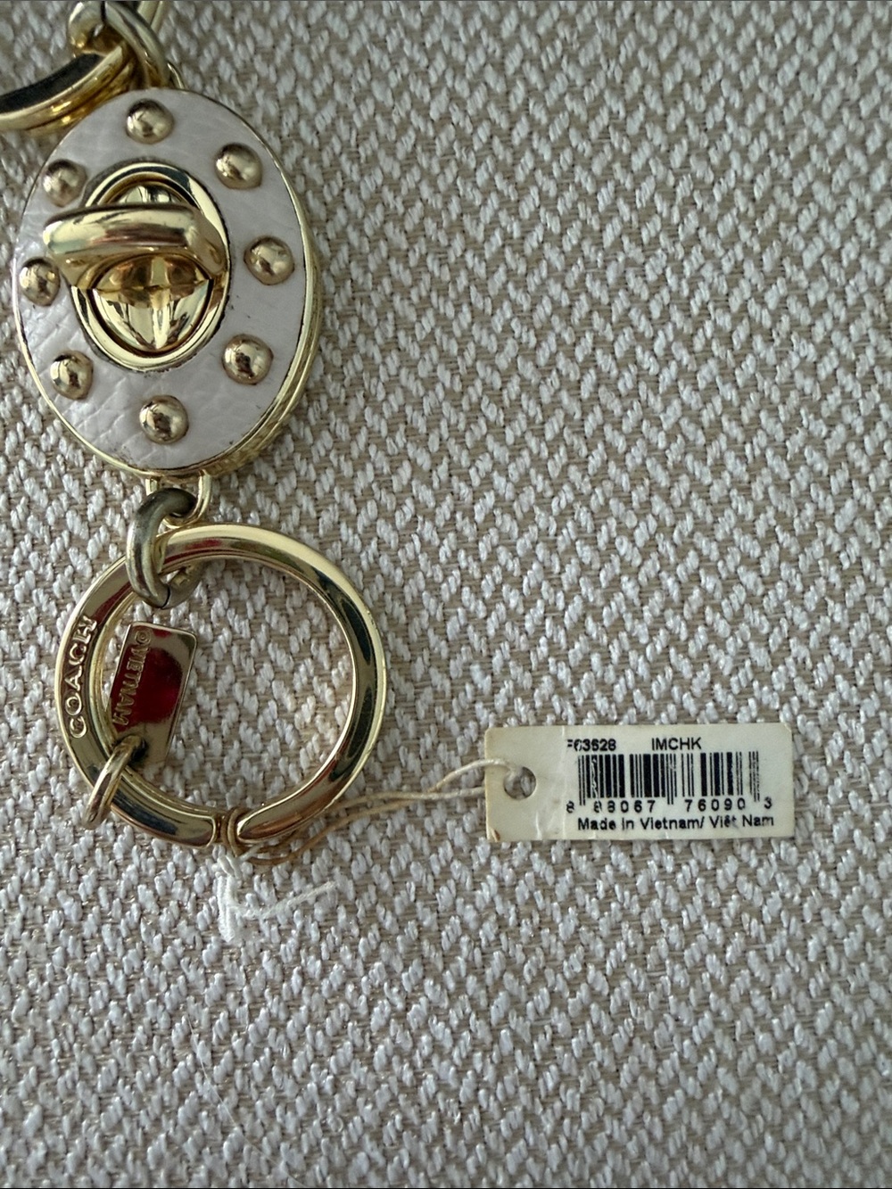 Coach Gold and White Turnlock Oval Valet Key - Picture 2 of 4